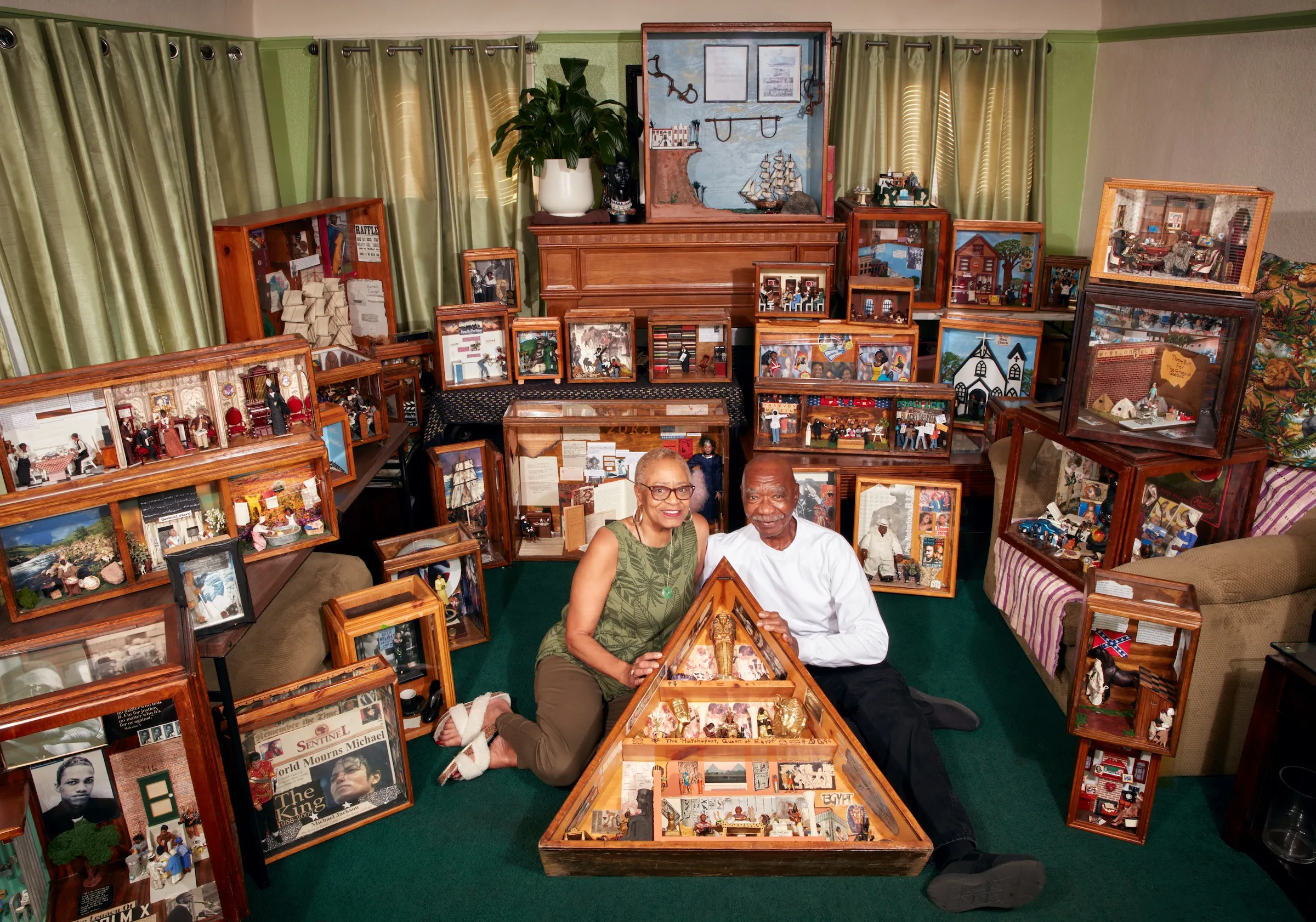 Karen Collins and Eddie Lewis in their living room, which doubles as Karen’s workshop, at the African American Miniature Museum (all photos by and courtesy Ryan Schude)