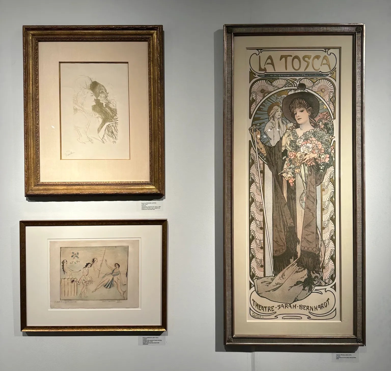Mucha prints in the booth of Isselbacher Gallery & Timothy Baum