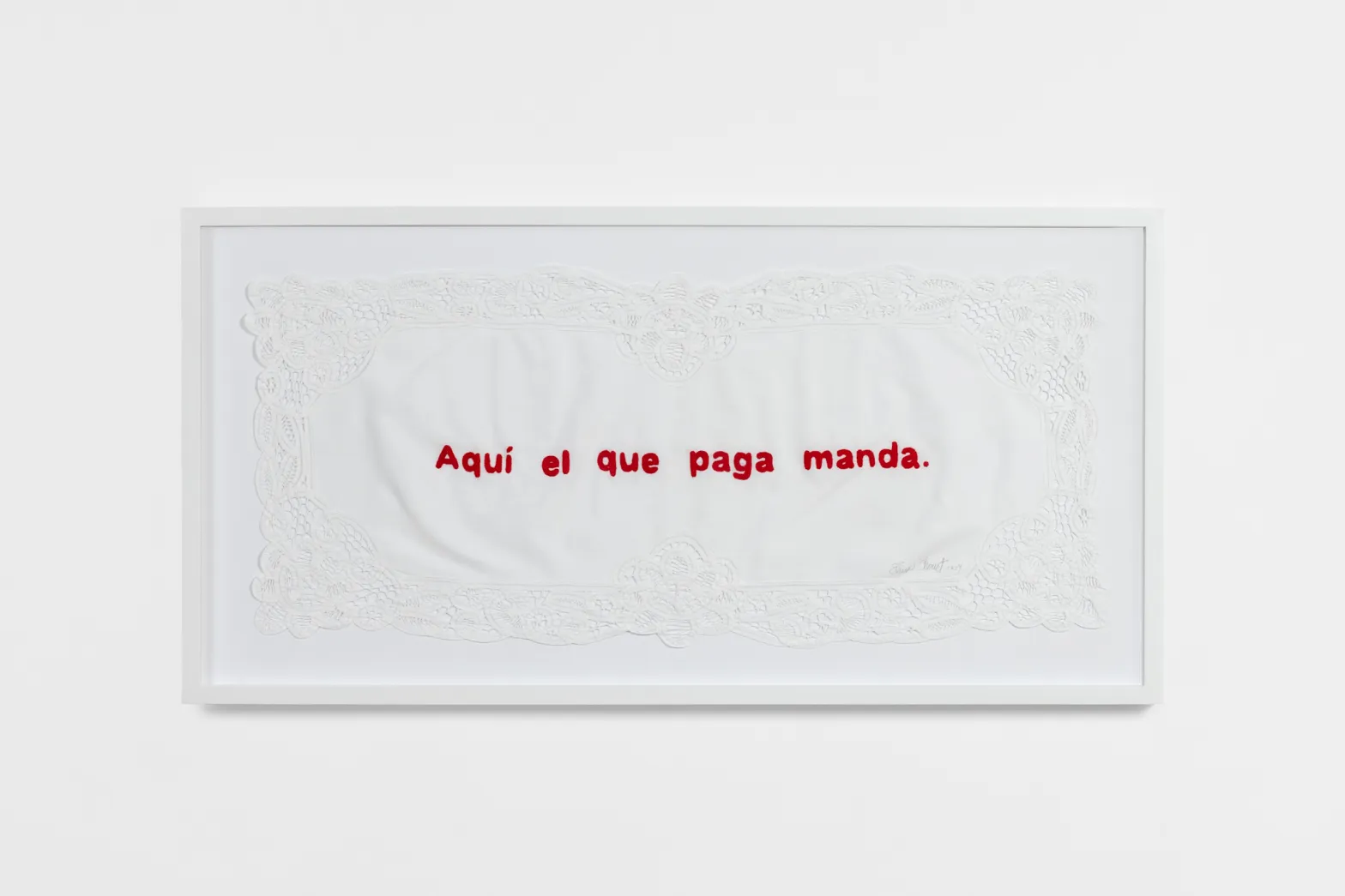 Translation: “Here, the one who pays, rules.” One of several hand-embroidered textiles from Elina Chauvet’s ongoing Heridas Domesticas (Domestic Wounds) (2023–) series.
