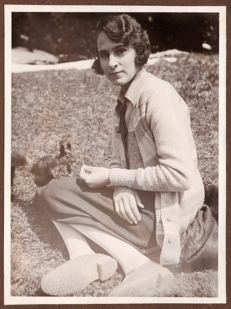 Photo by Man Ray of Gala playing with a squirrel around 1925 (© Succession Paul Éluard)